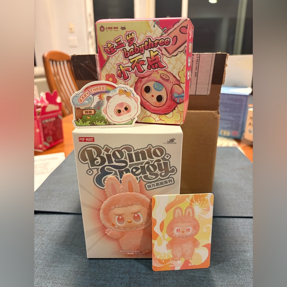 Big Into Energy Labubu (Happiness) & Baby3 Animal Party (cat) opened from bottom